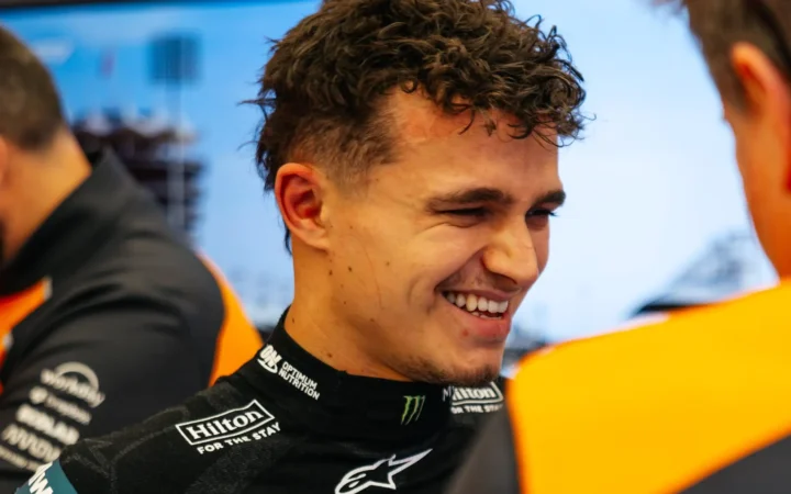 Lando Norris relaxes in the McLaren garage during 2025 Pre-season Testing in Bahrain – Day One